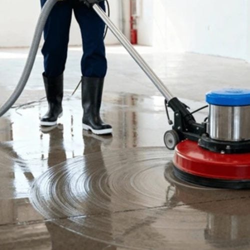 person-using-industrial-floor-cleaner-600nw-2701764333 (1)