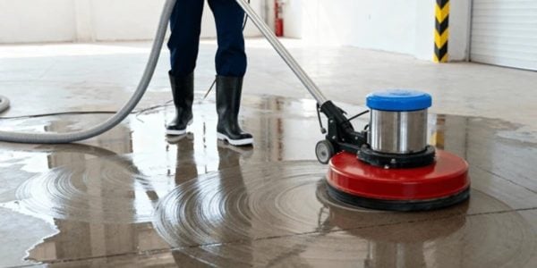 person-using-industrial-floor-cleaner-600nw-2701764333 (1)